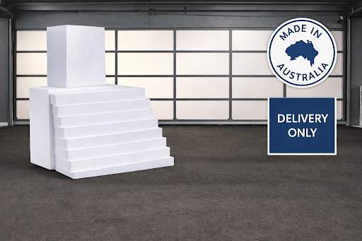 EPS foam insulation sheets stacked indoors in Sydney, NSW 2000, Australia, ready for building and construction use.